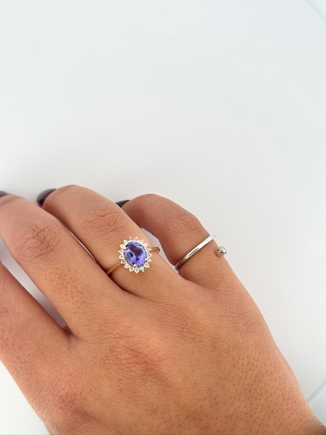 Tanzanite Oval and Diamond Halo Ring